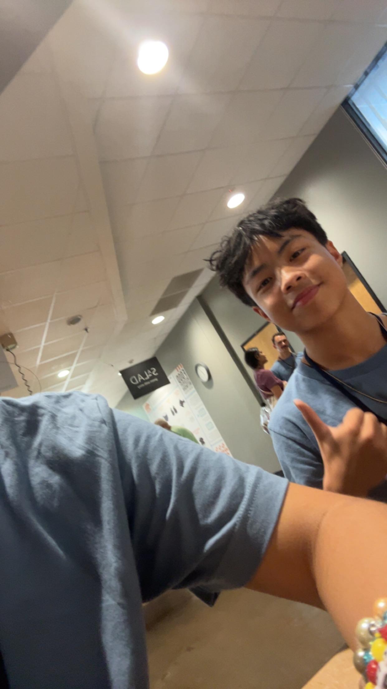 A boy taking a selfie