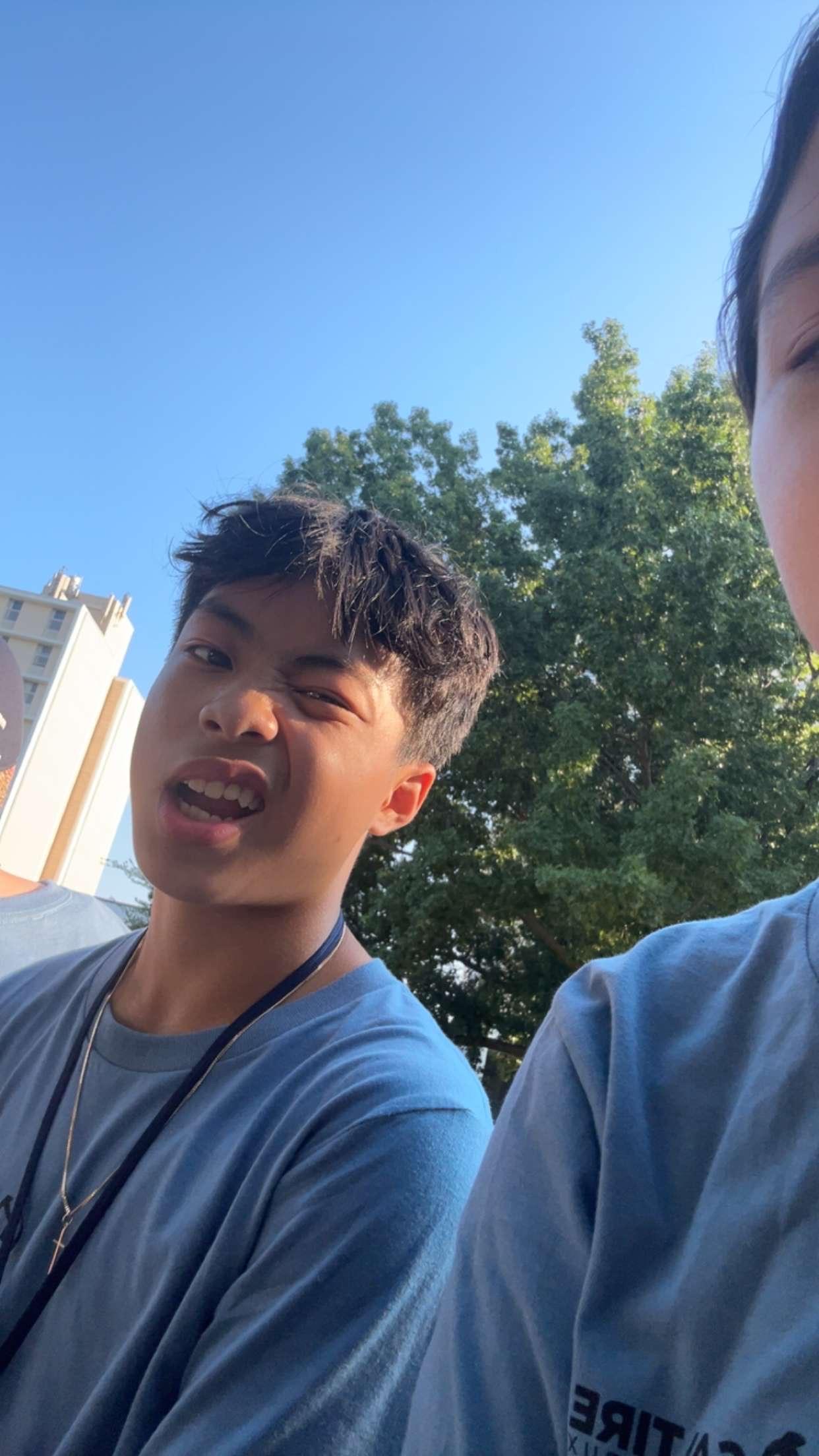 A boy taking a selfie