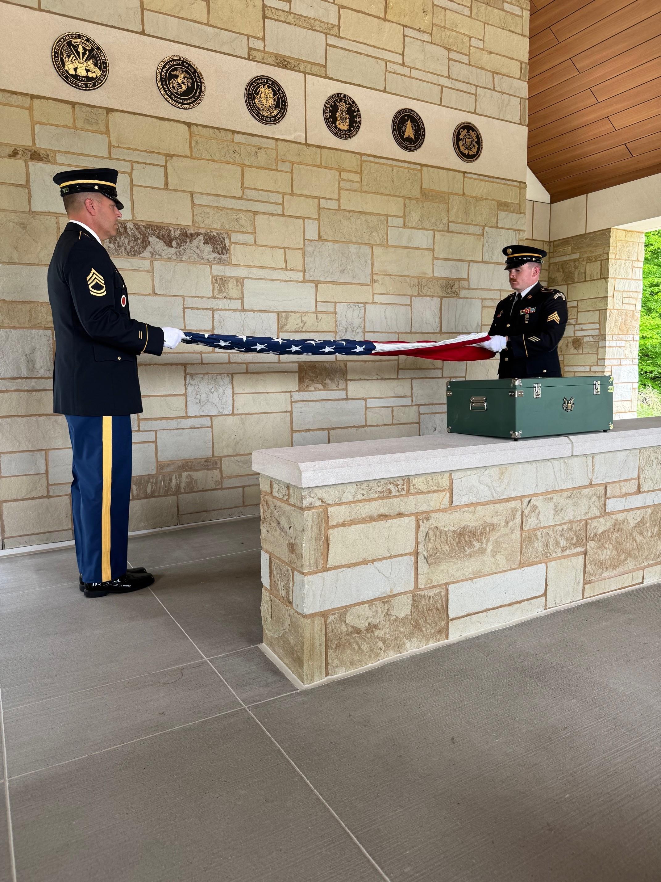 A soldier holding a flag