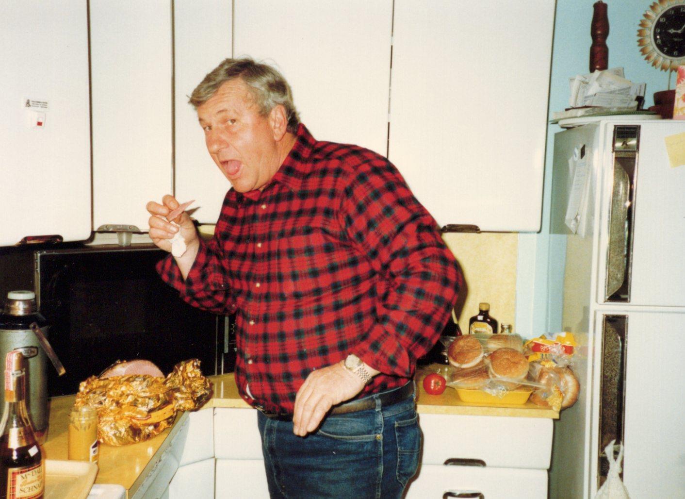 A man in a red flannel shirt