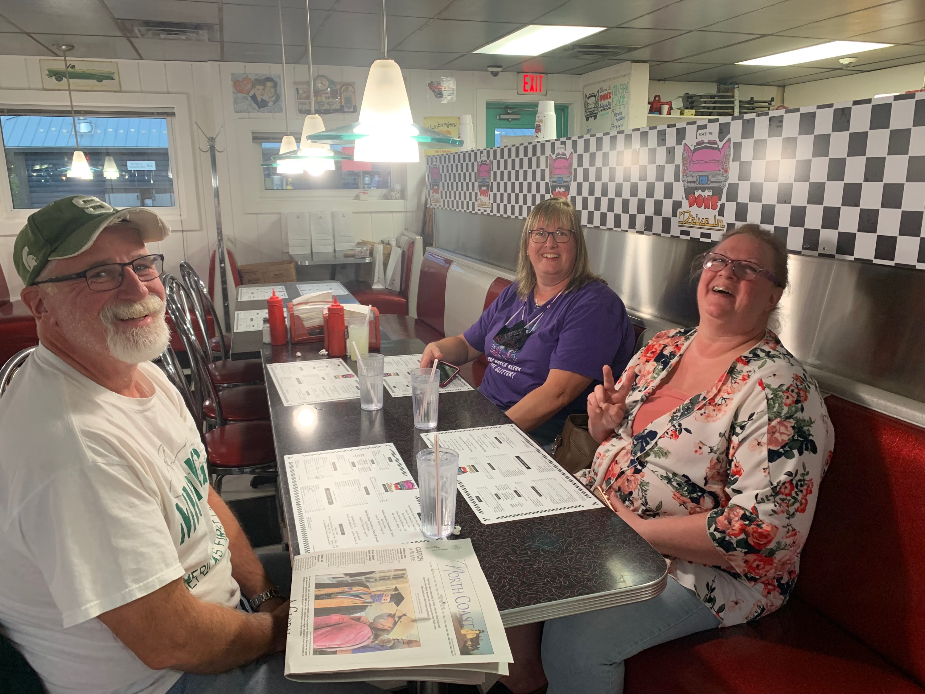 A group of people sitting at a table