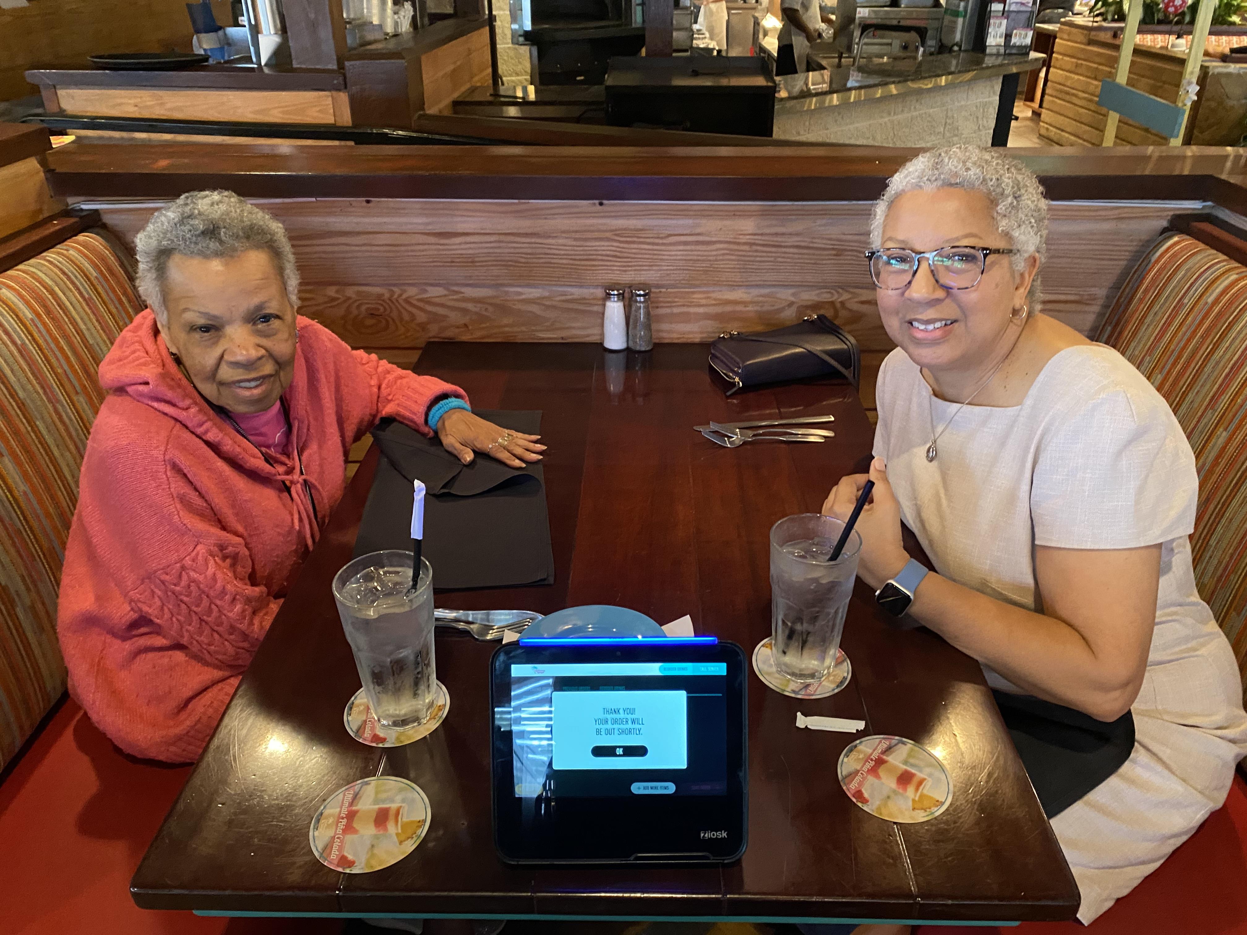 Two women sitting at a table