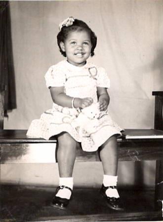 A child sitting on a bench