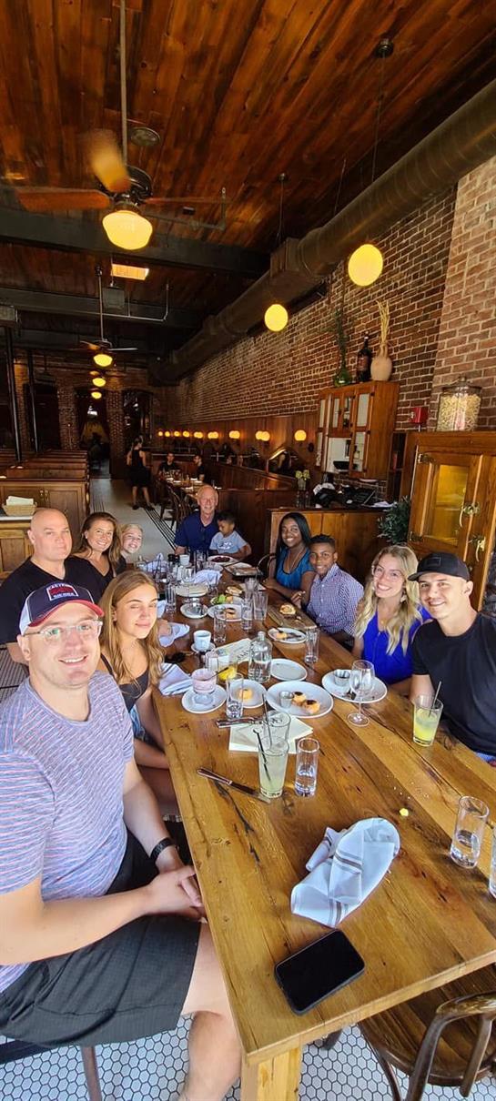 A group of people sitting at a table