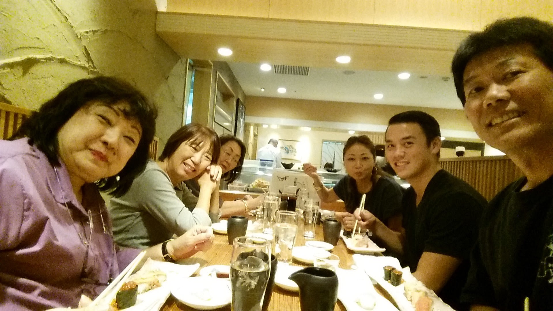 A group of people sitting at a table