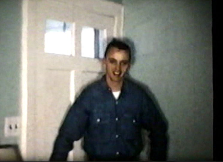 A man in a blue shirt