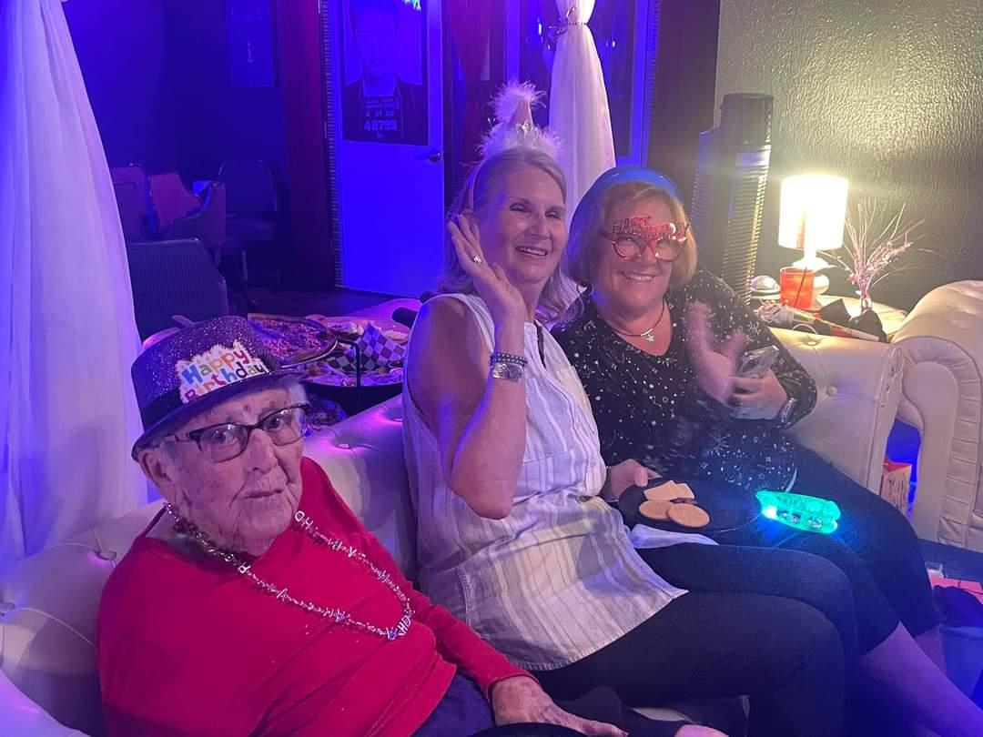 A group of women sitting on a couch