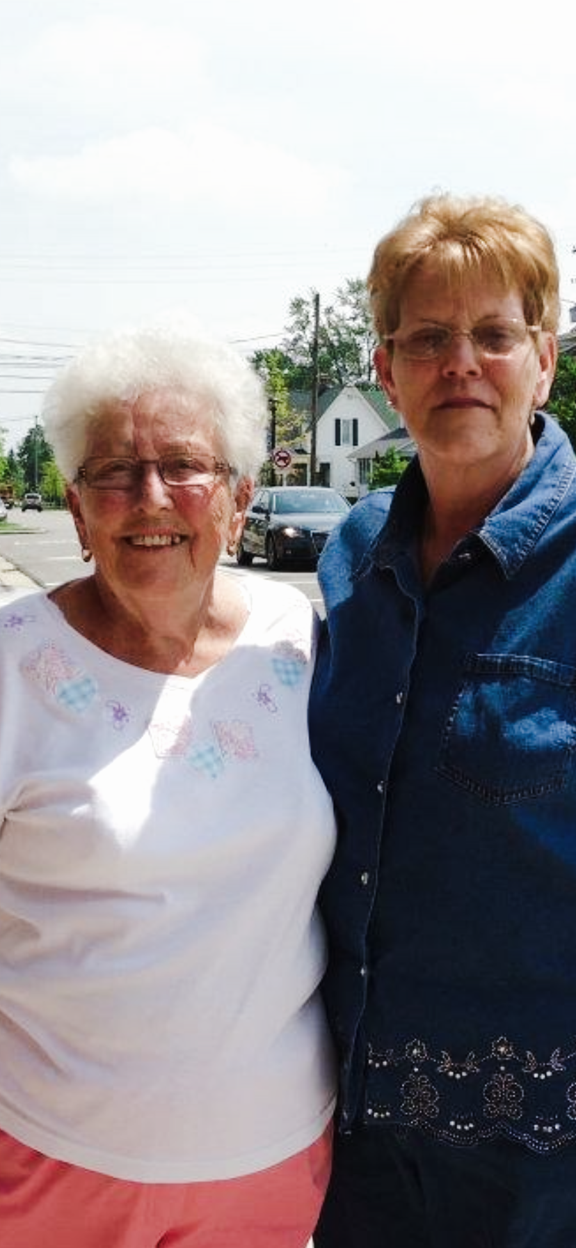 Two women standing next to each other