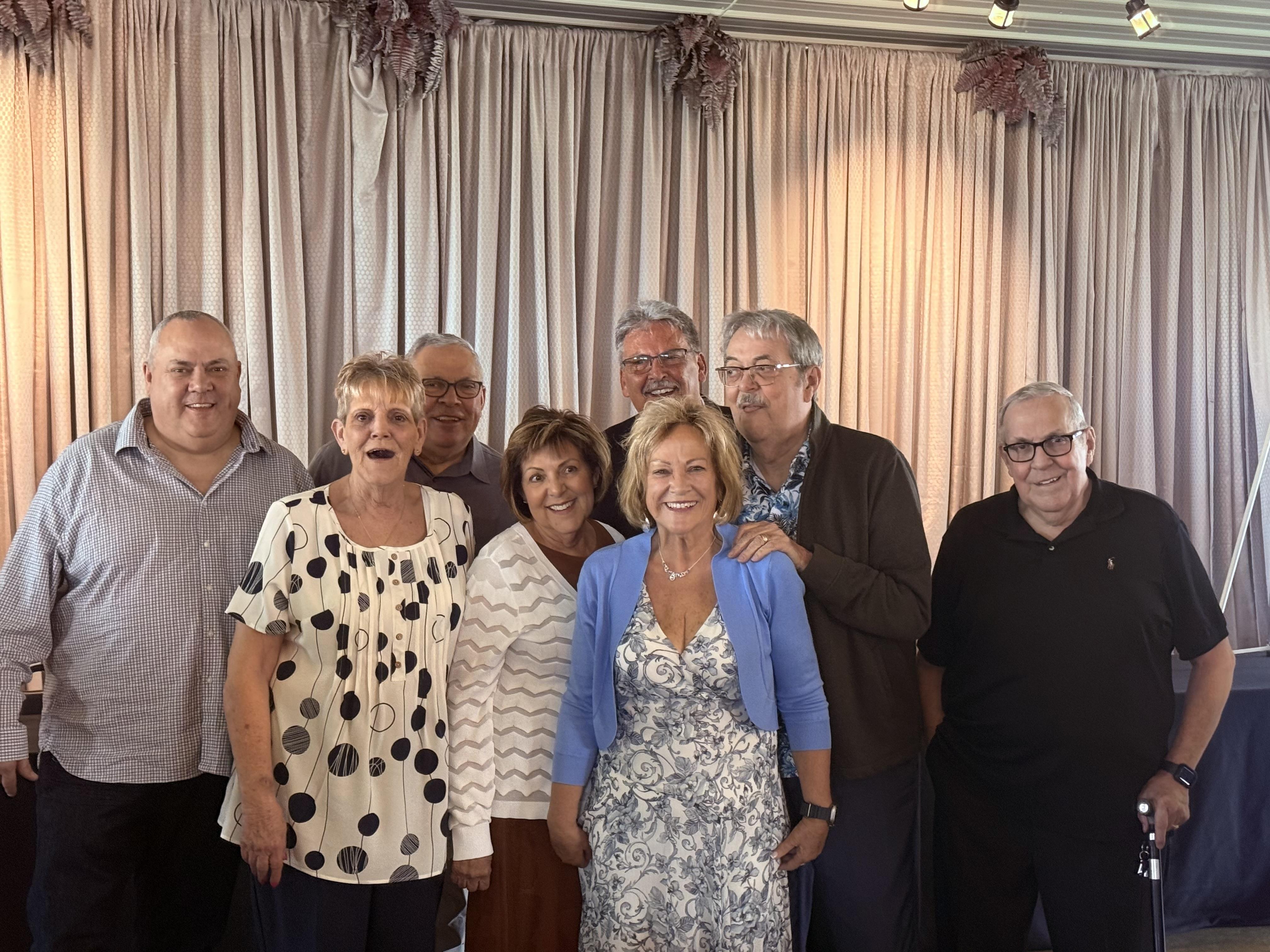 A group of people posing for a photo
