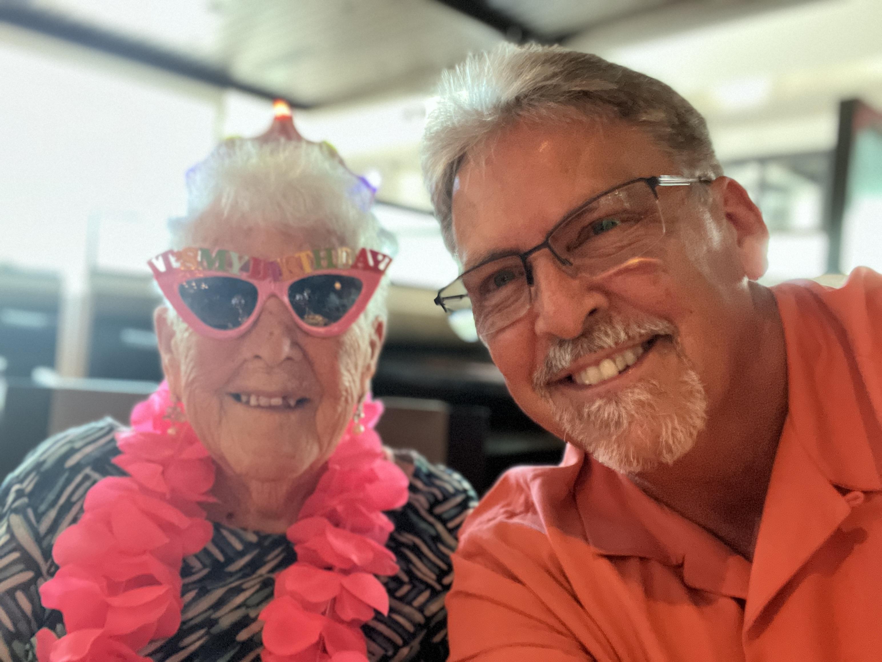 A man and woman smiling for a picture