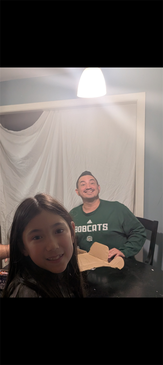 A man and girl taking a selfie