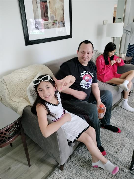 A group of people sitting on a couch