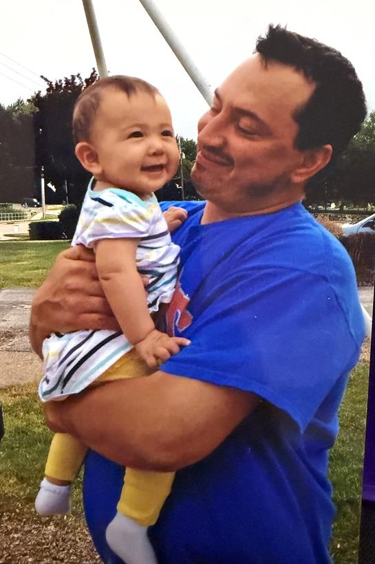 A man holding a baby