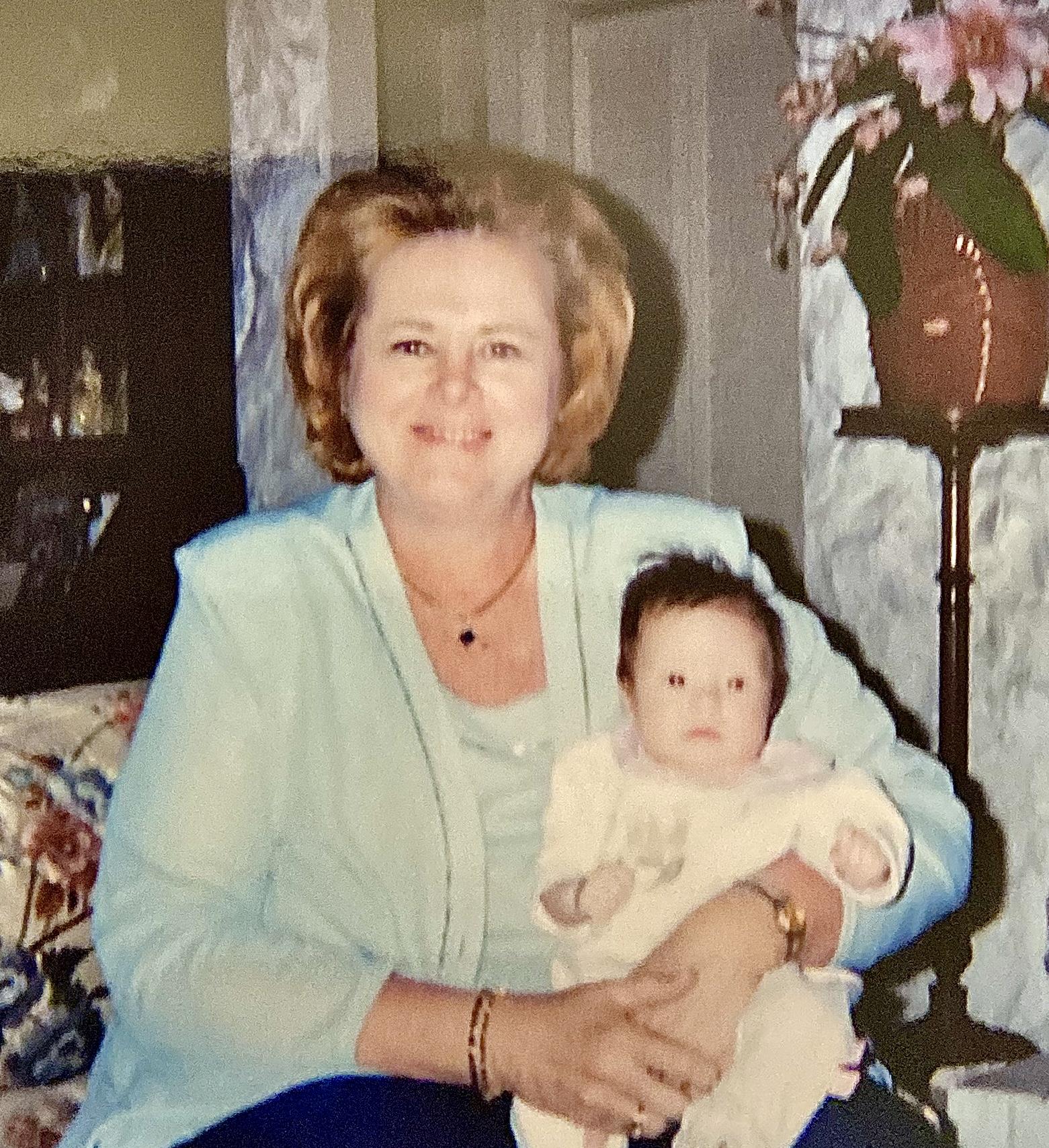 A woman holding a baby