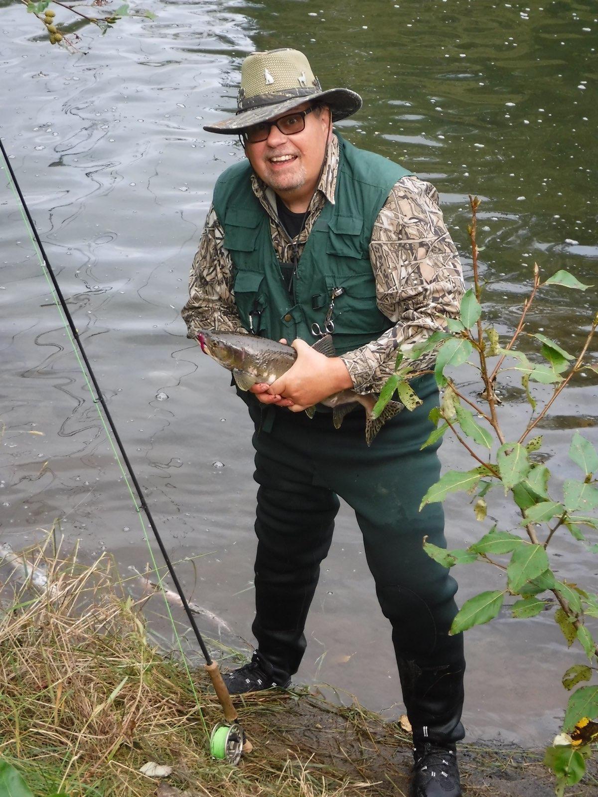 A man holding a fish