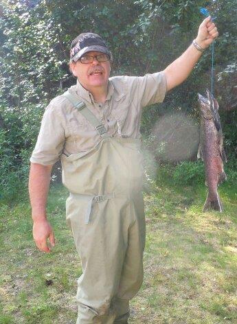 A man holding a fish