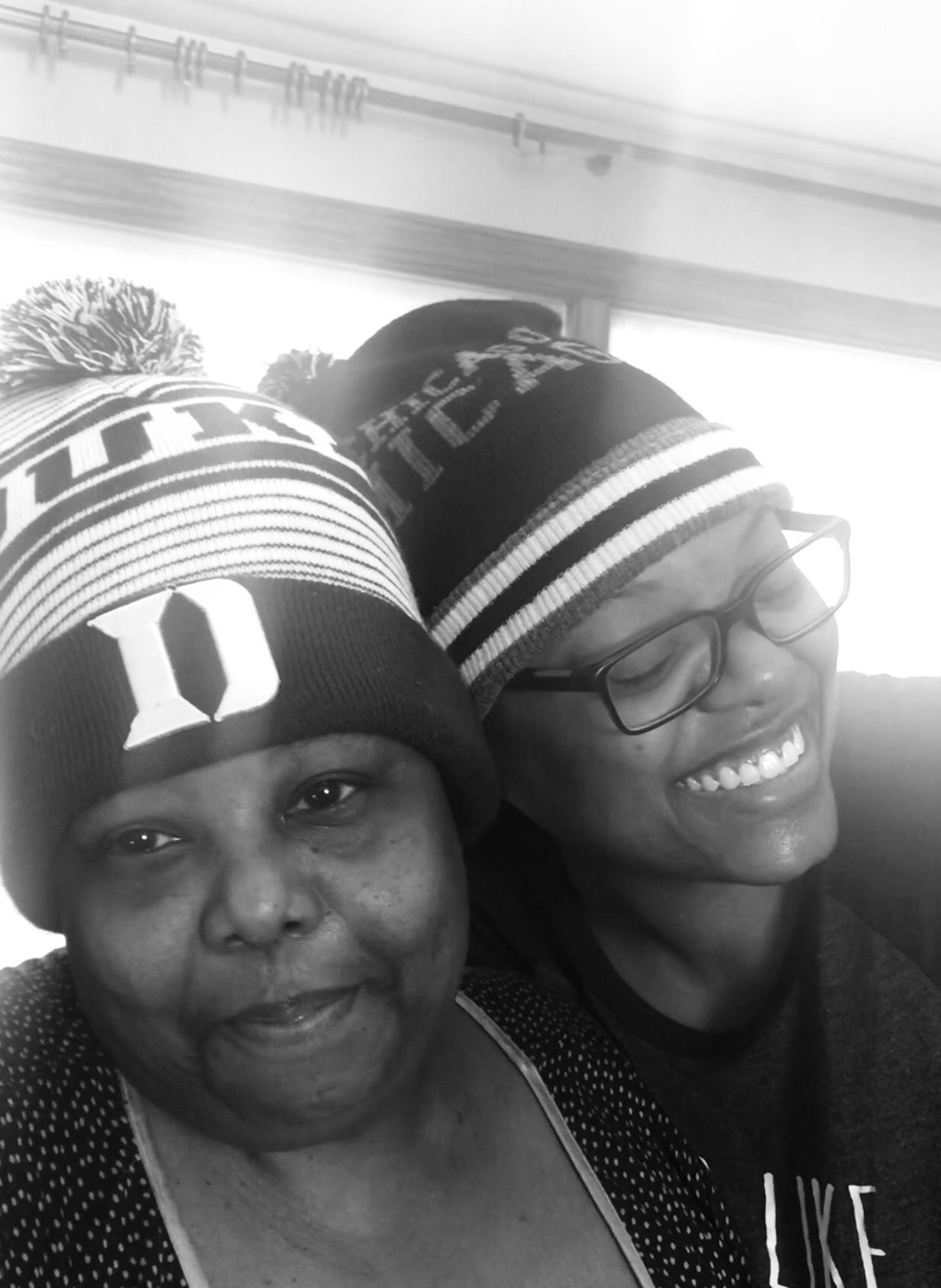 A woman and a boy wearing hats