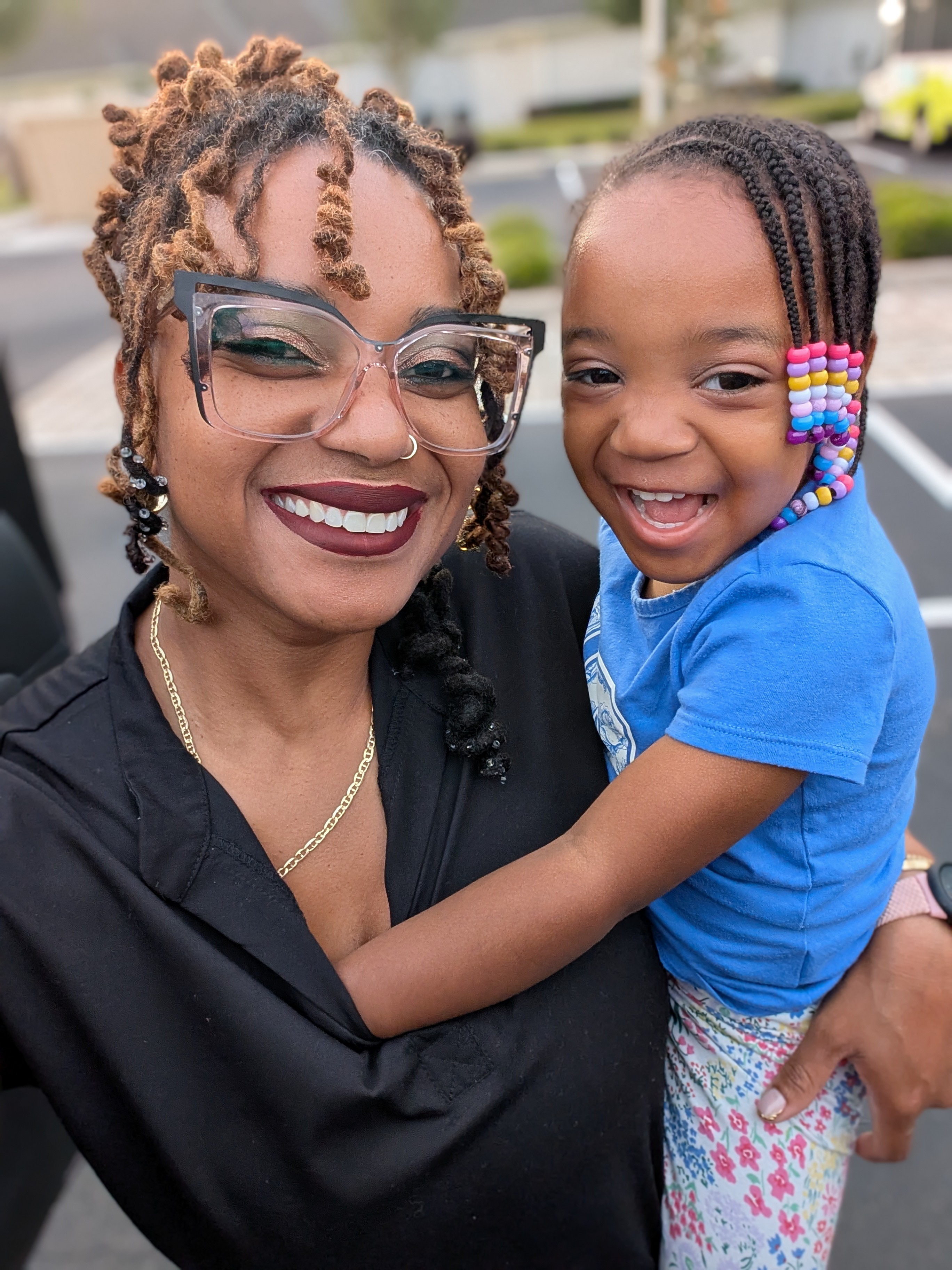 A woman holding a child