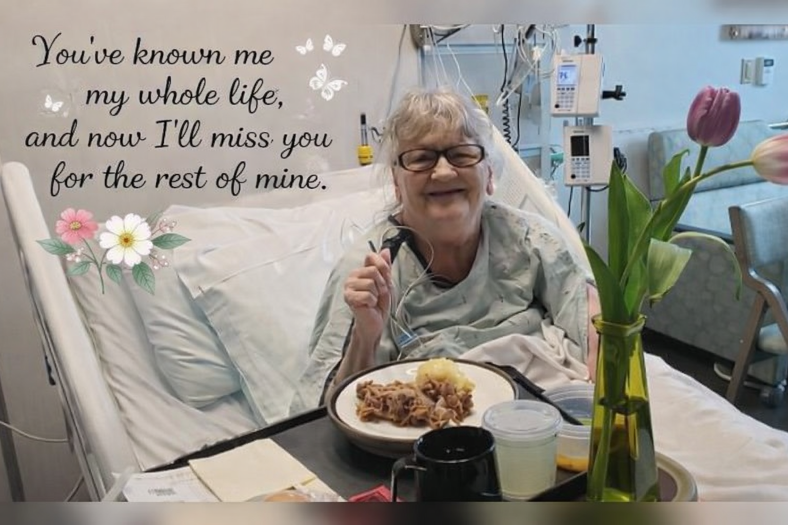 A woman in a hospital bed eating food