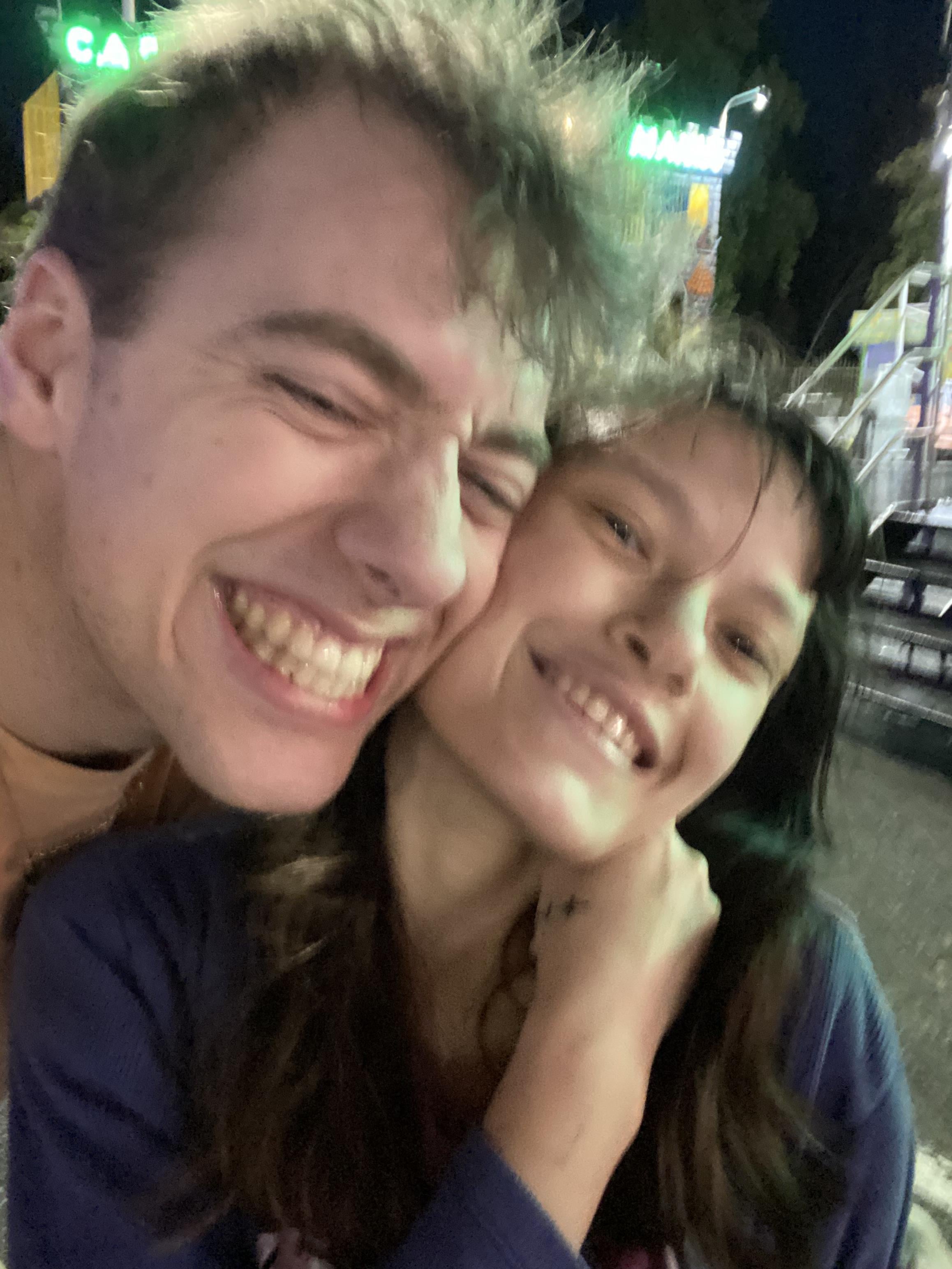 A man and woman taking a selfie