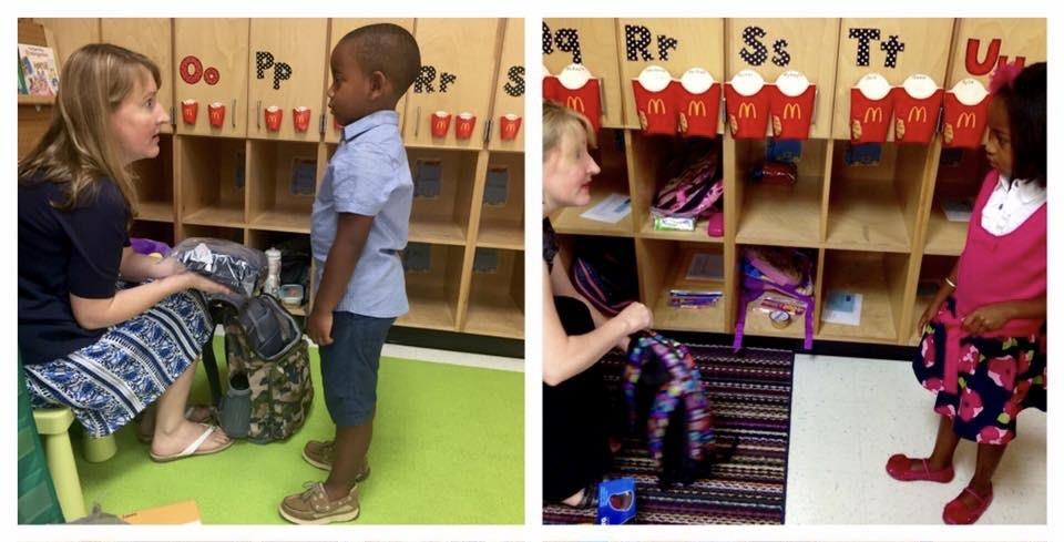 A child standing in front of a woman