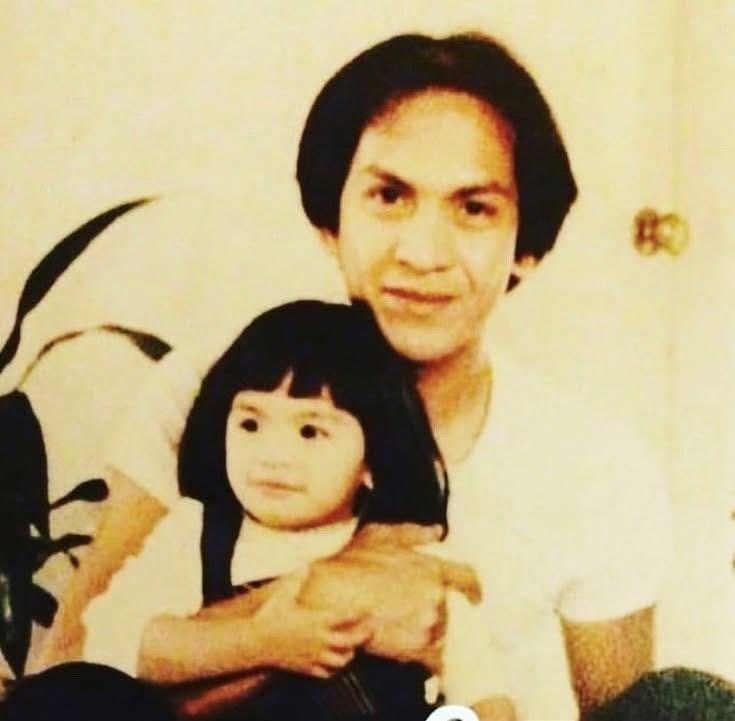 A man holding a baby