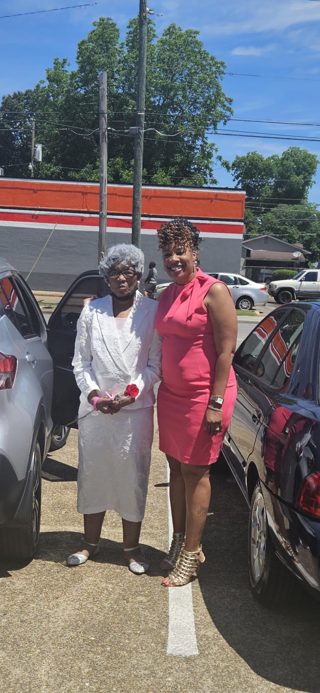 Two women standing next to each other