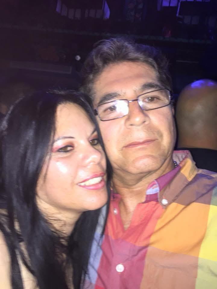 A man and woman taking a selfie