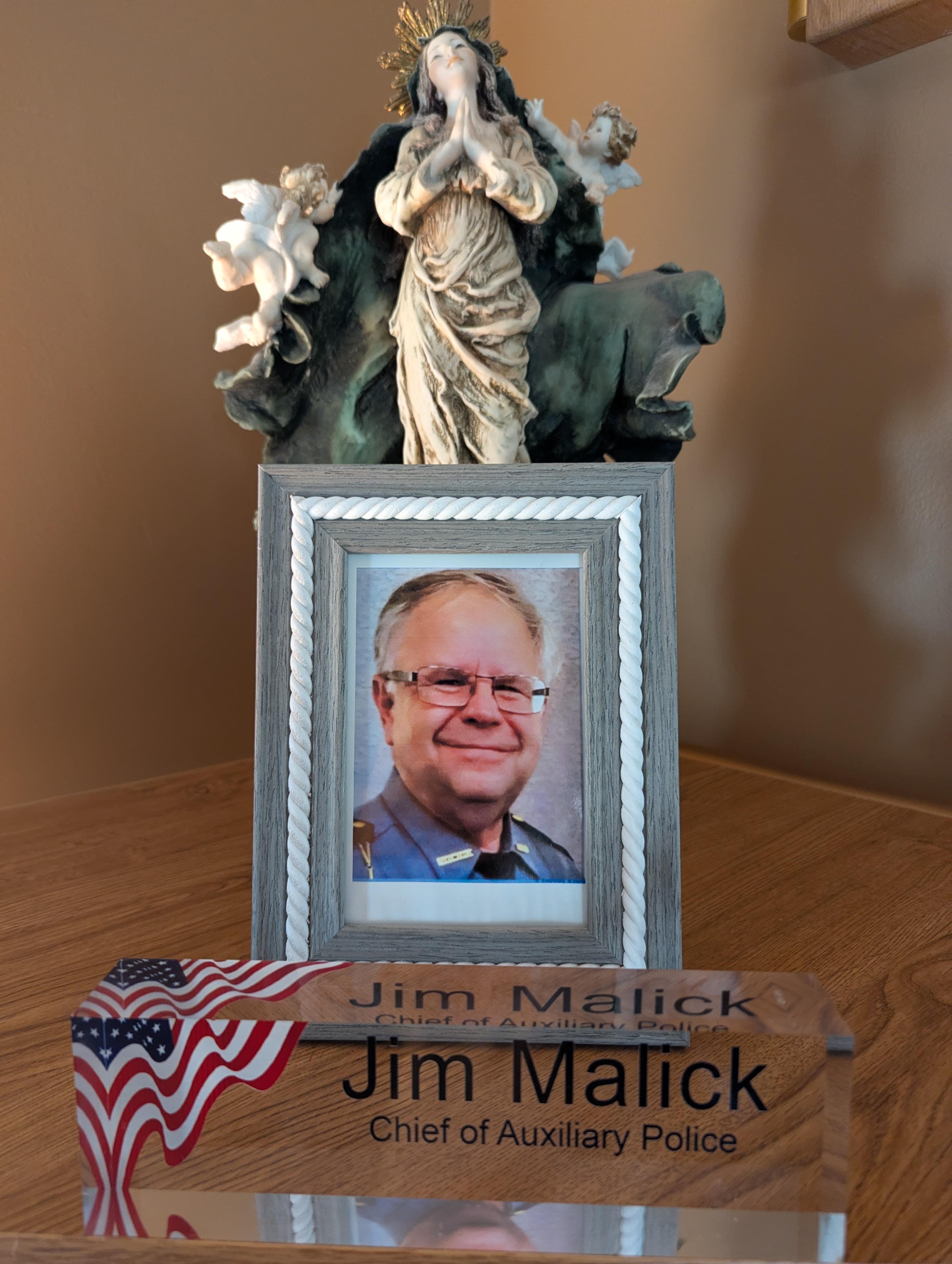 A statue of a man in a frame