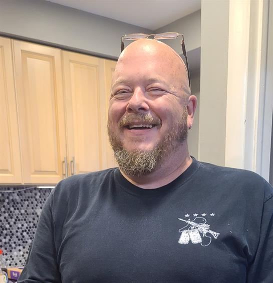 A man smiling for the camera