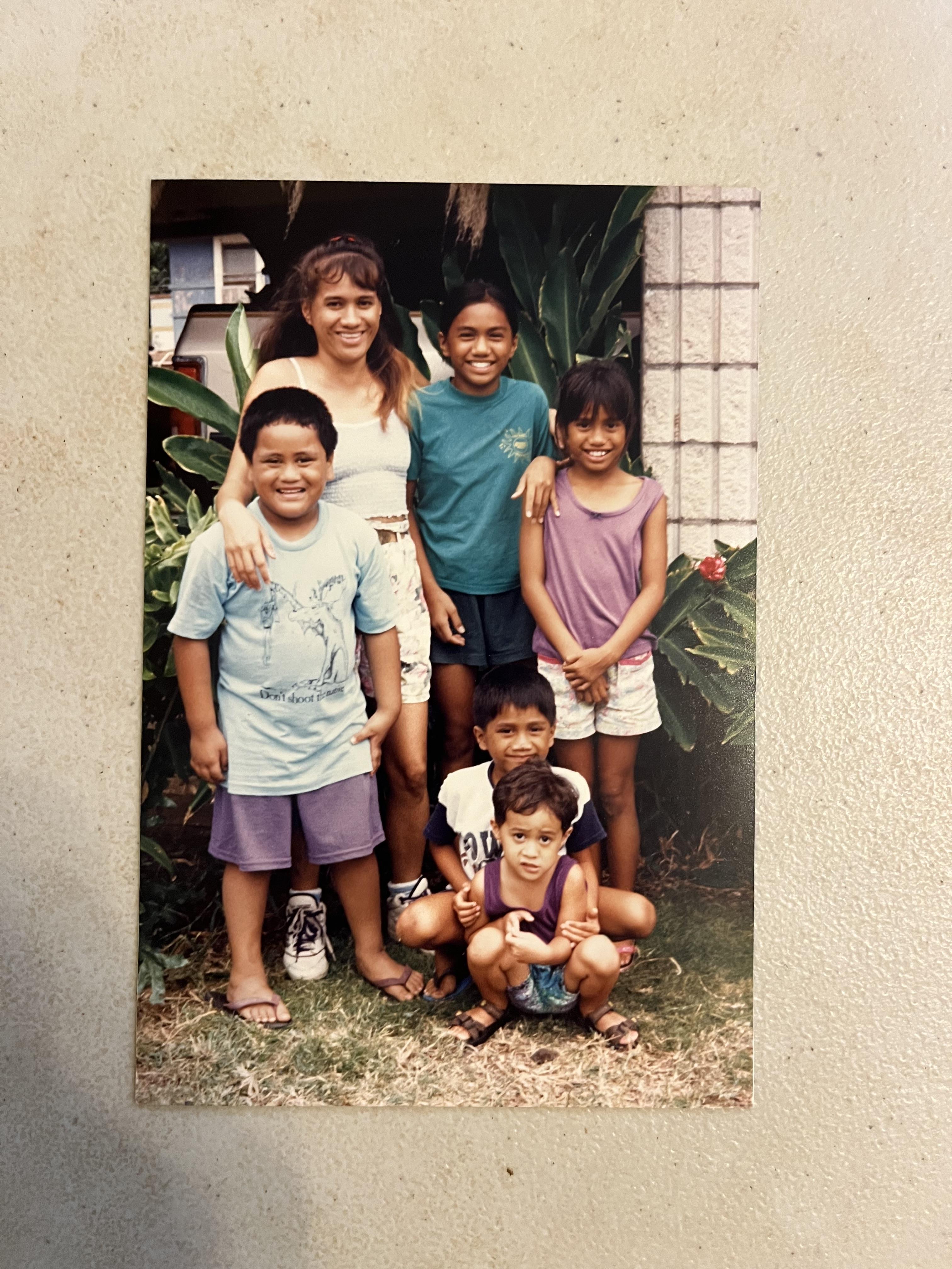 A group of children posing for a photo
