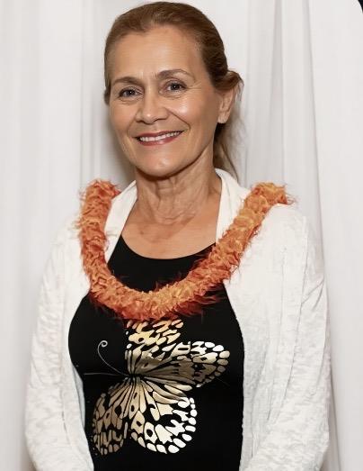 A woman smiling at the camera