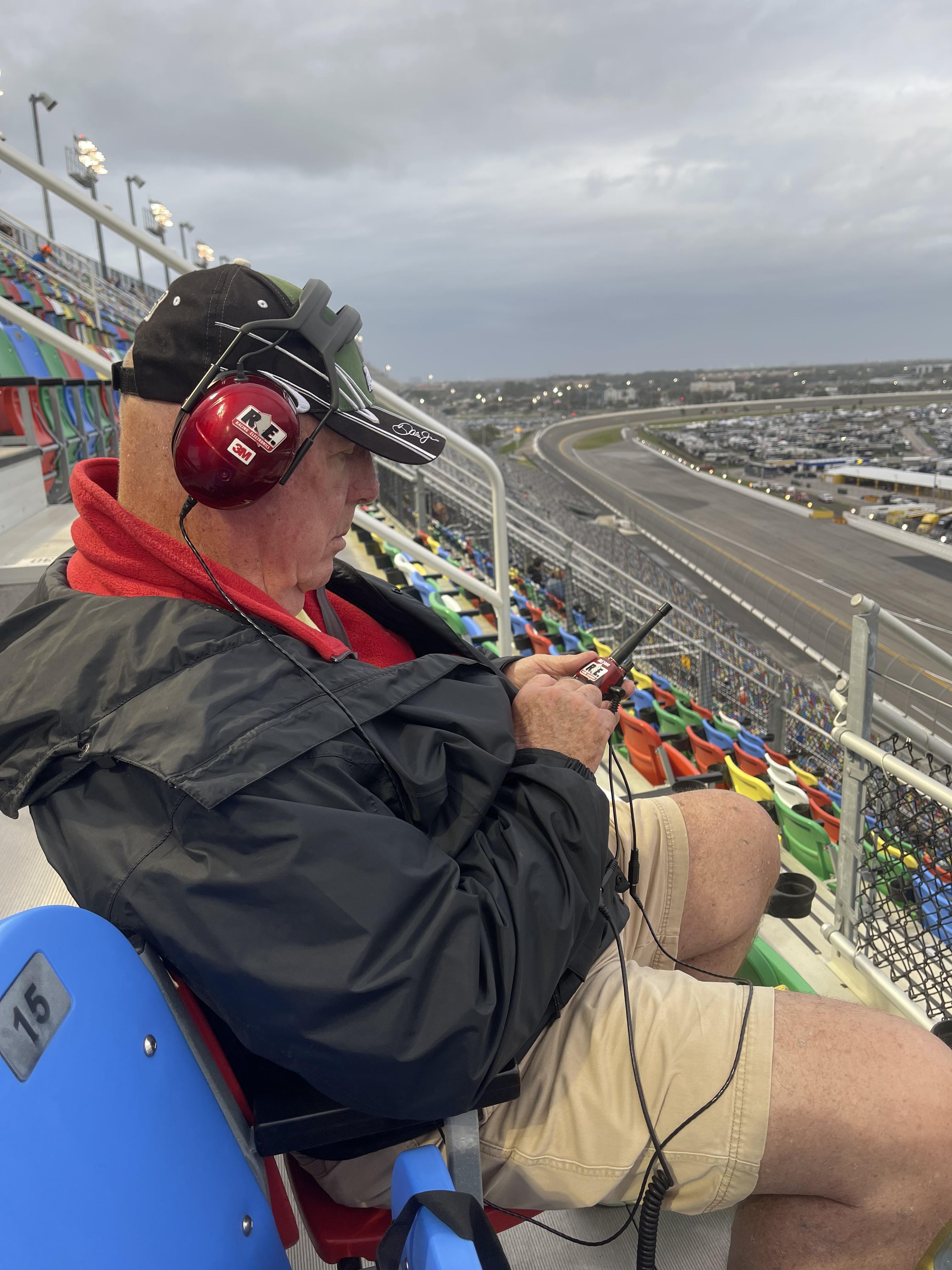 A man sitting in a stadium
