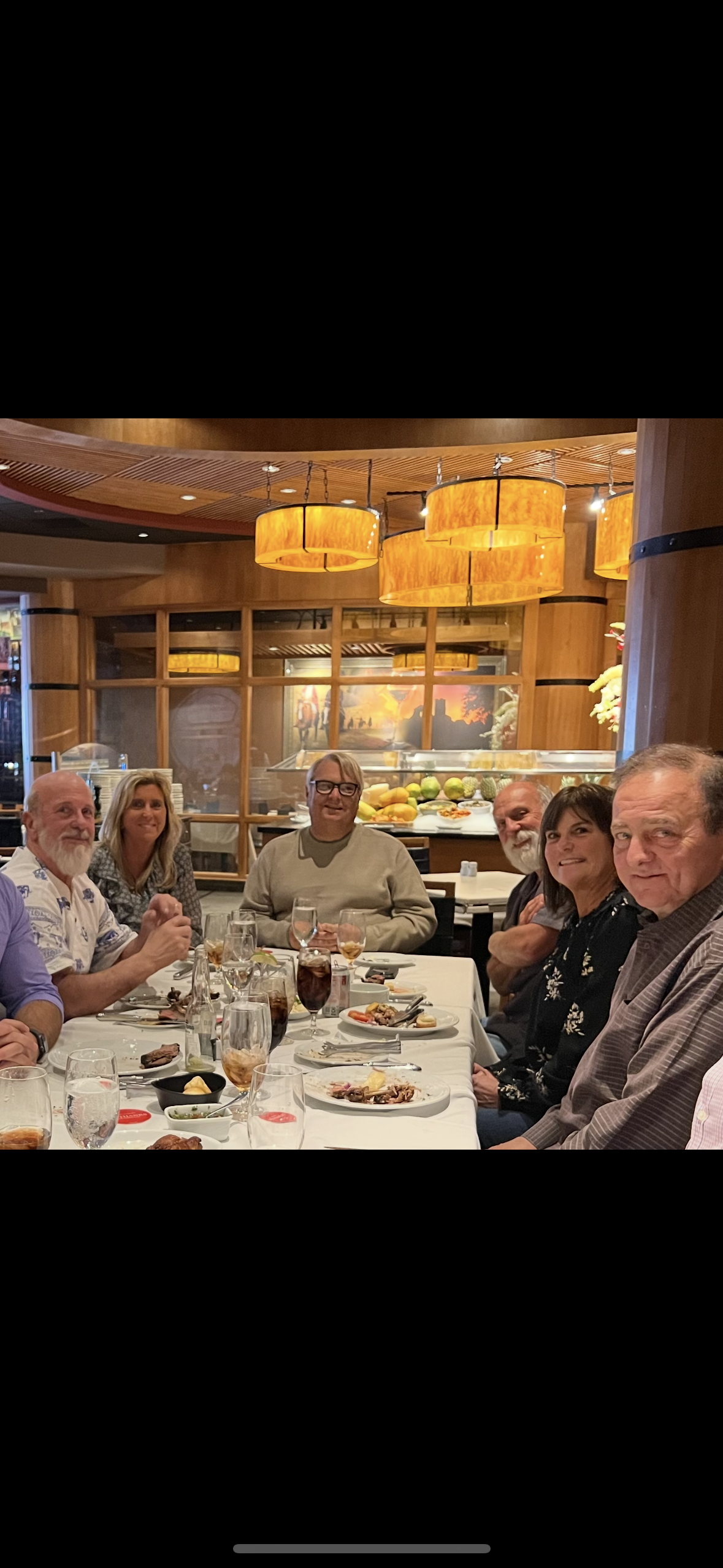 A group of people sitting at a table