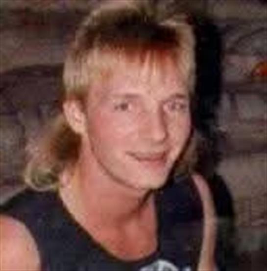 A man with blonde hair