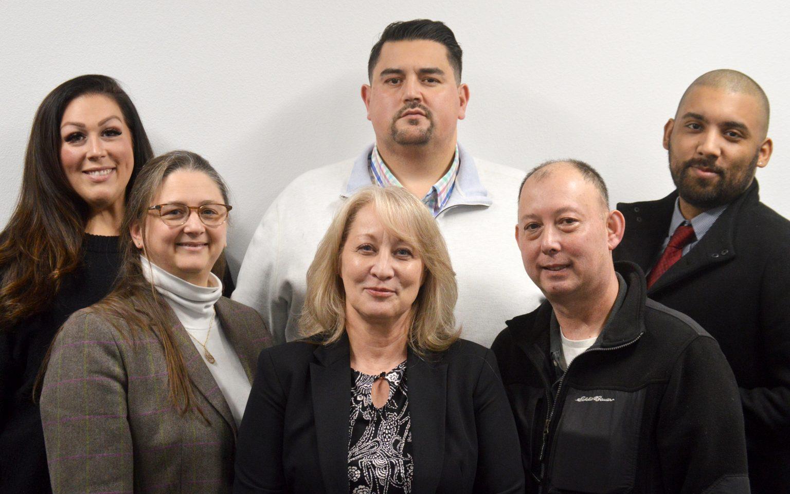 A group of people posing for a photo