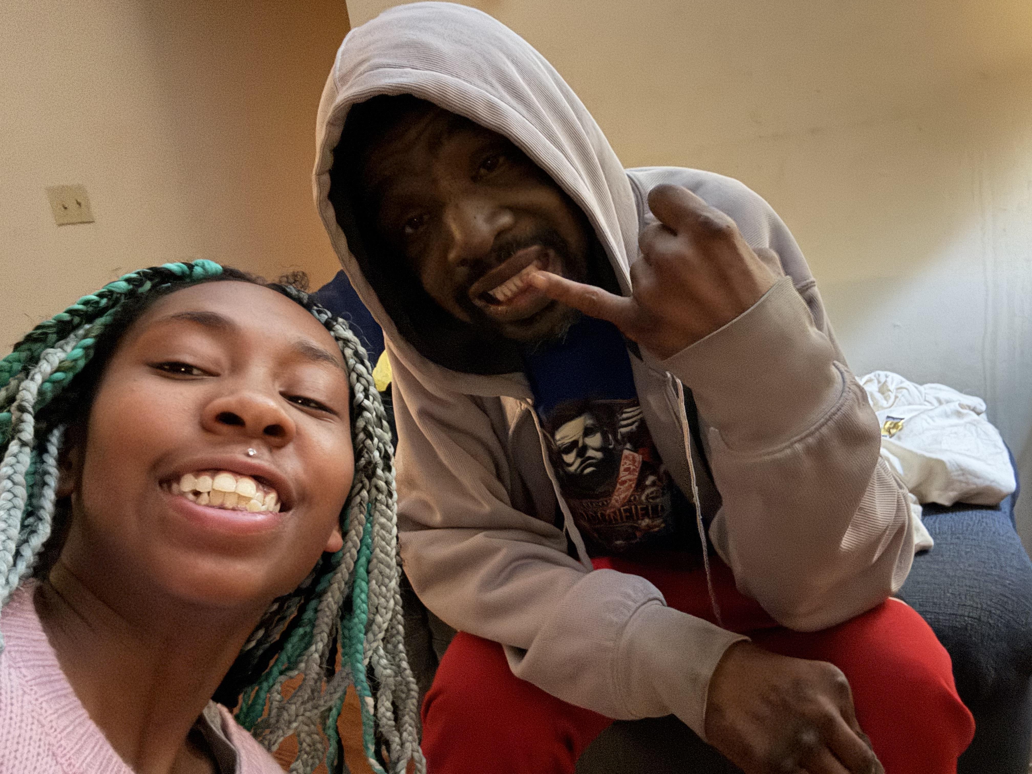 A man and woman taking a selfie