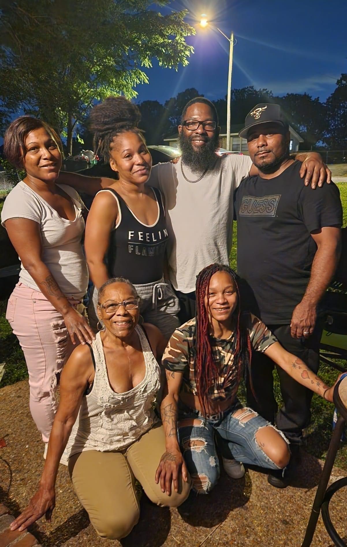 A group of people posing for a photo