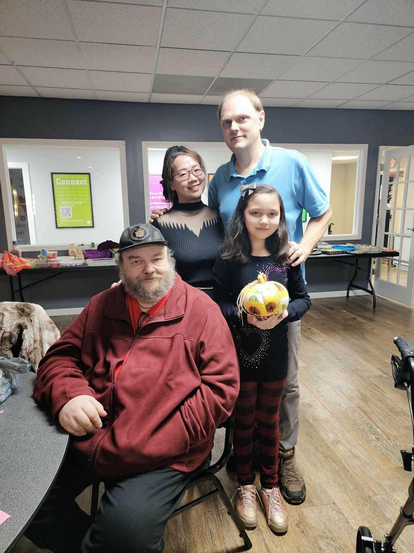 A group of people posing for a photo