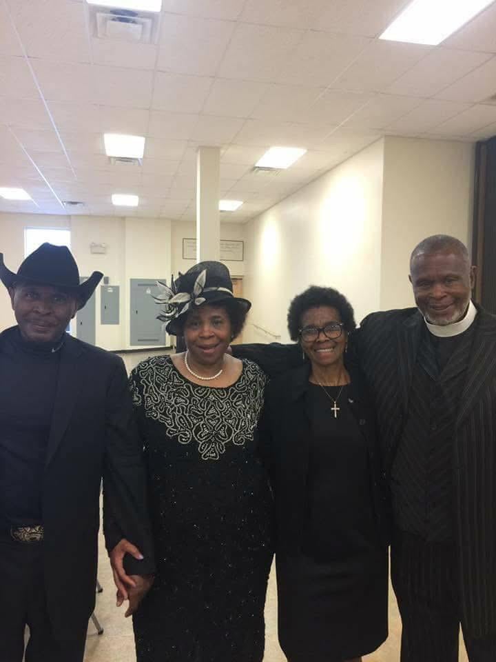 A group of people posing for a photo