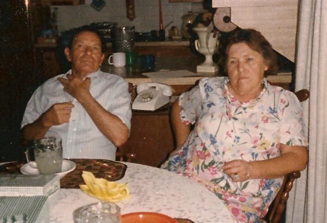 A man and woman sitting at a table