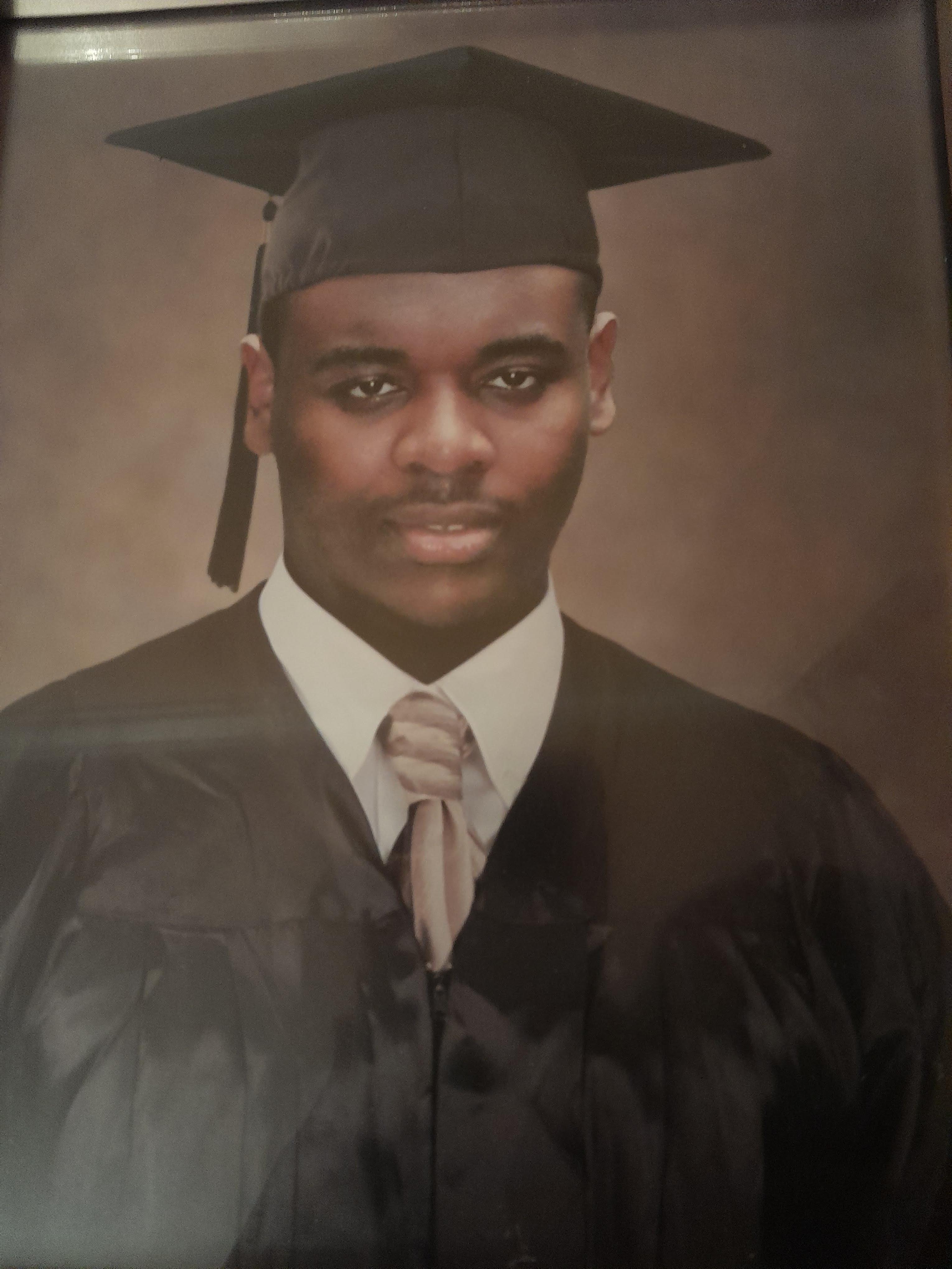 A man in a graduation gown