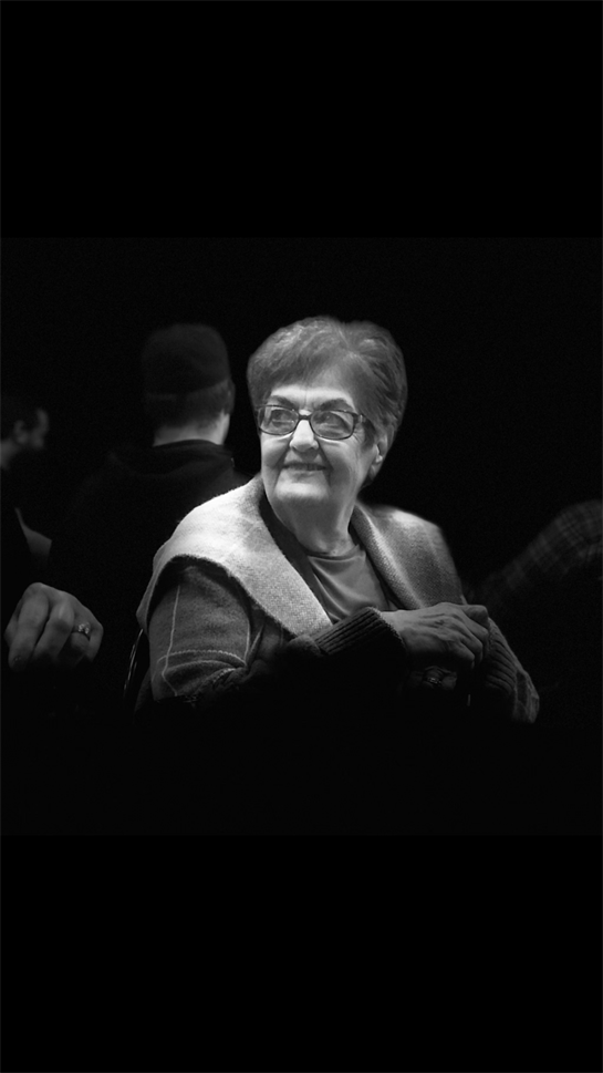 A woman smiling at camera