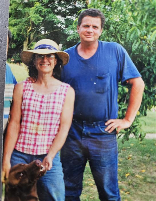 A man and woman standing next to each other
