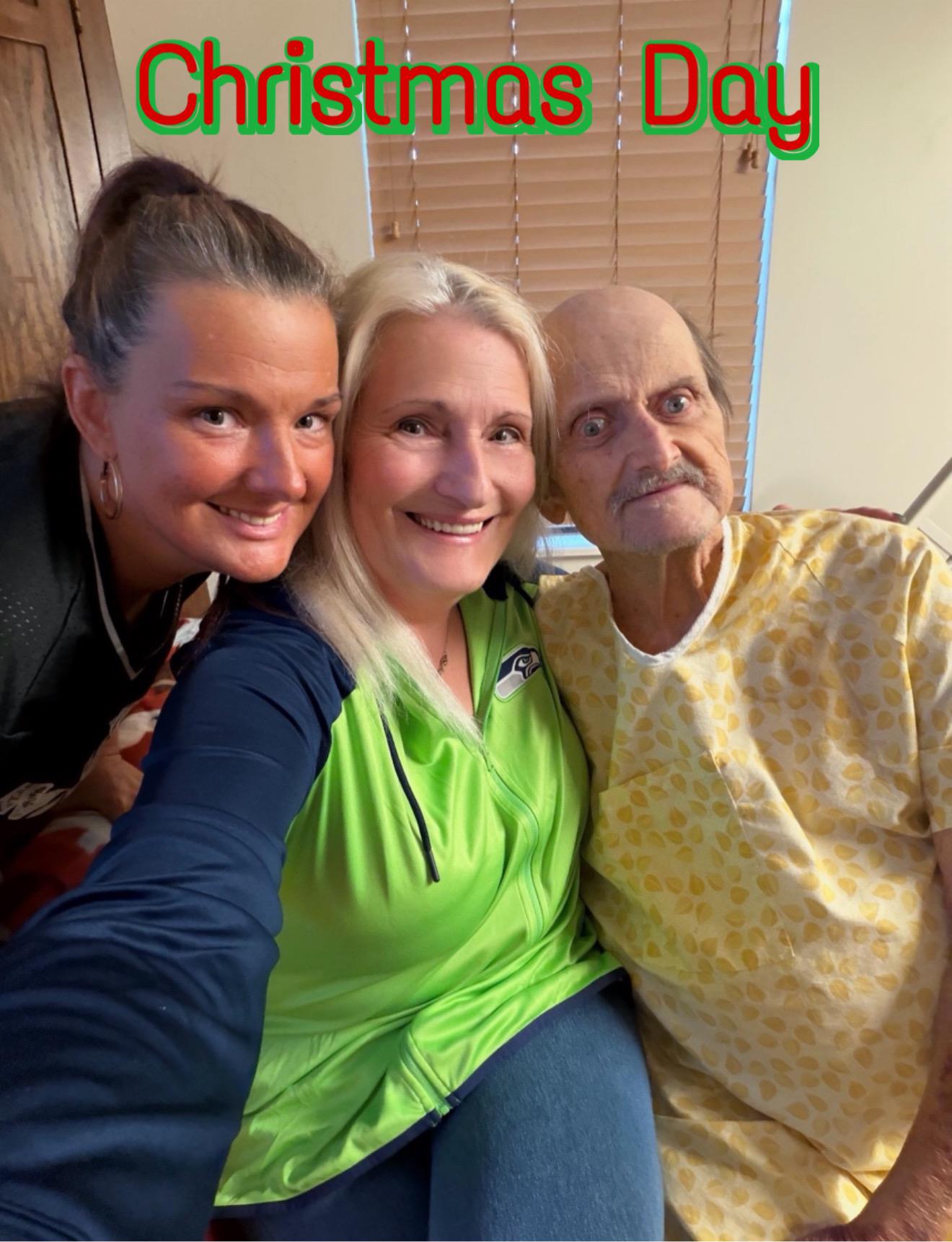 A group of people posing for a selfie