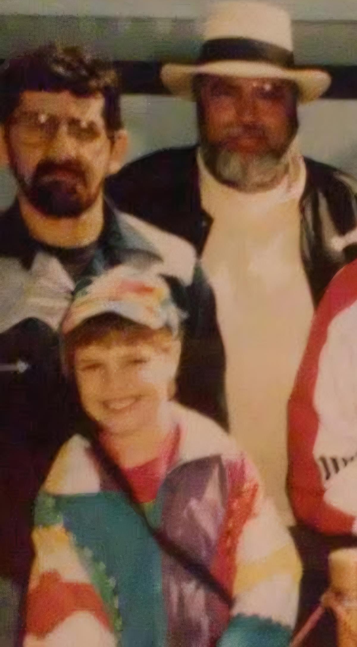 A group of men posing for a picture