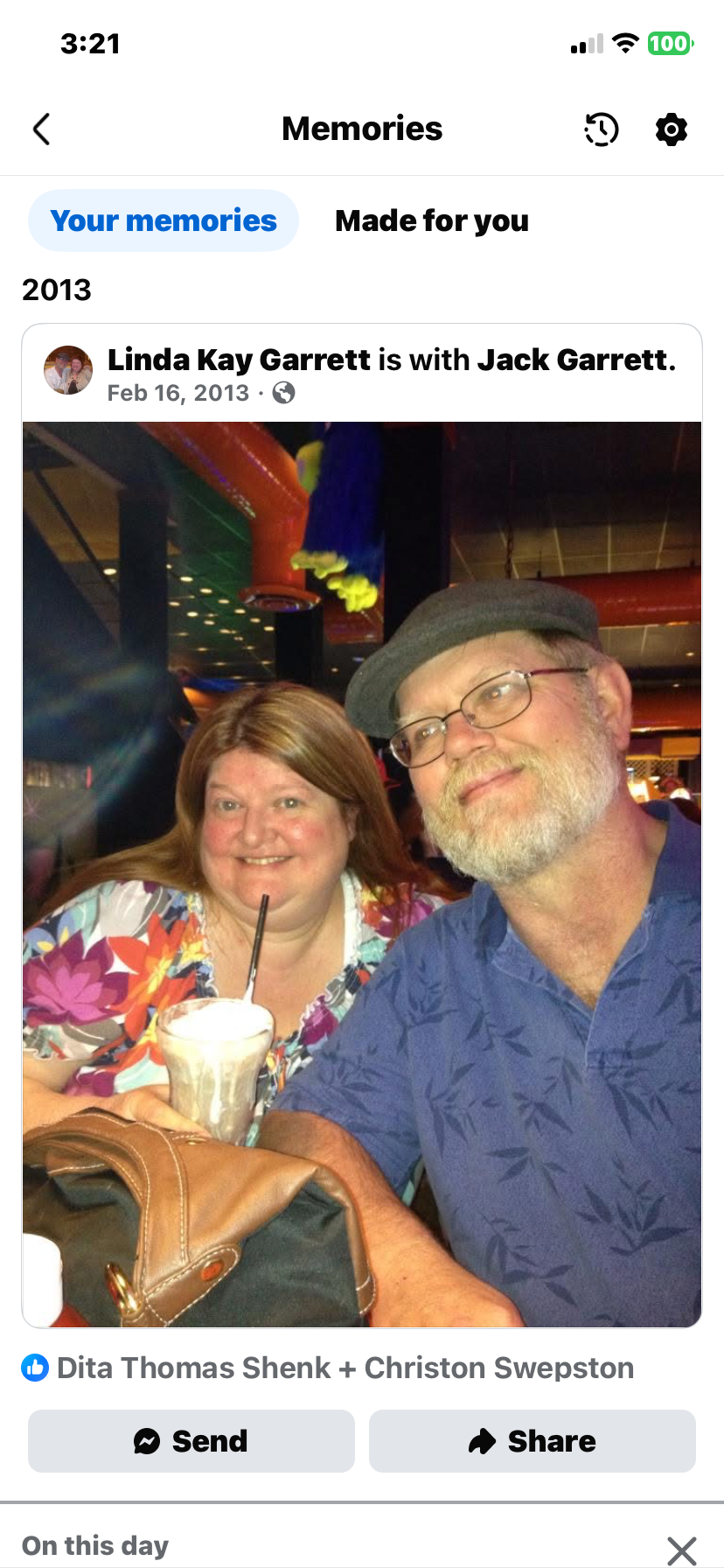 A man and woman taking a selfie