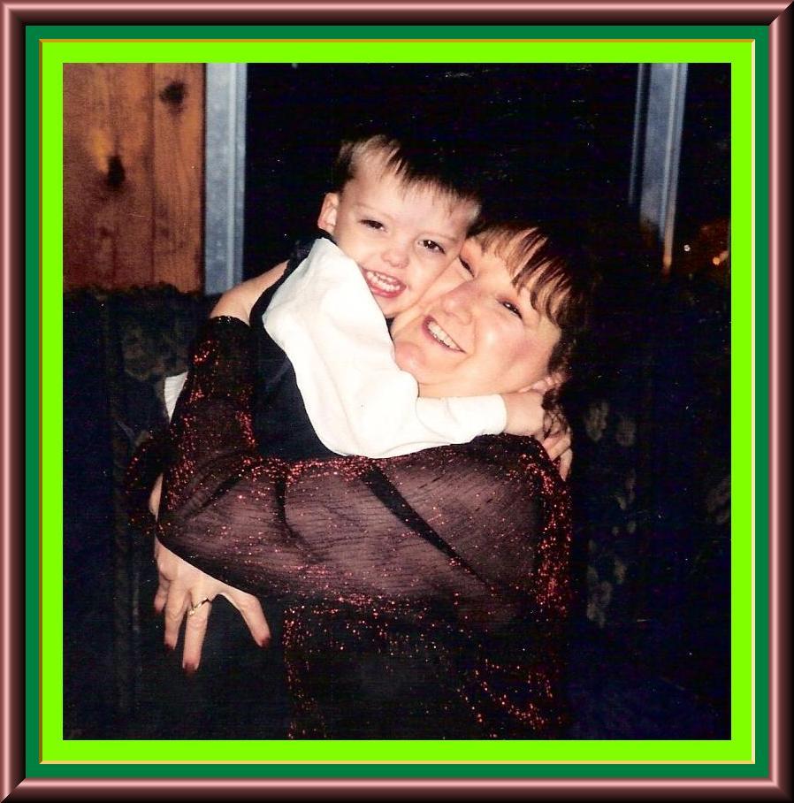 A woman hugging a child