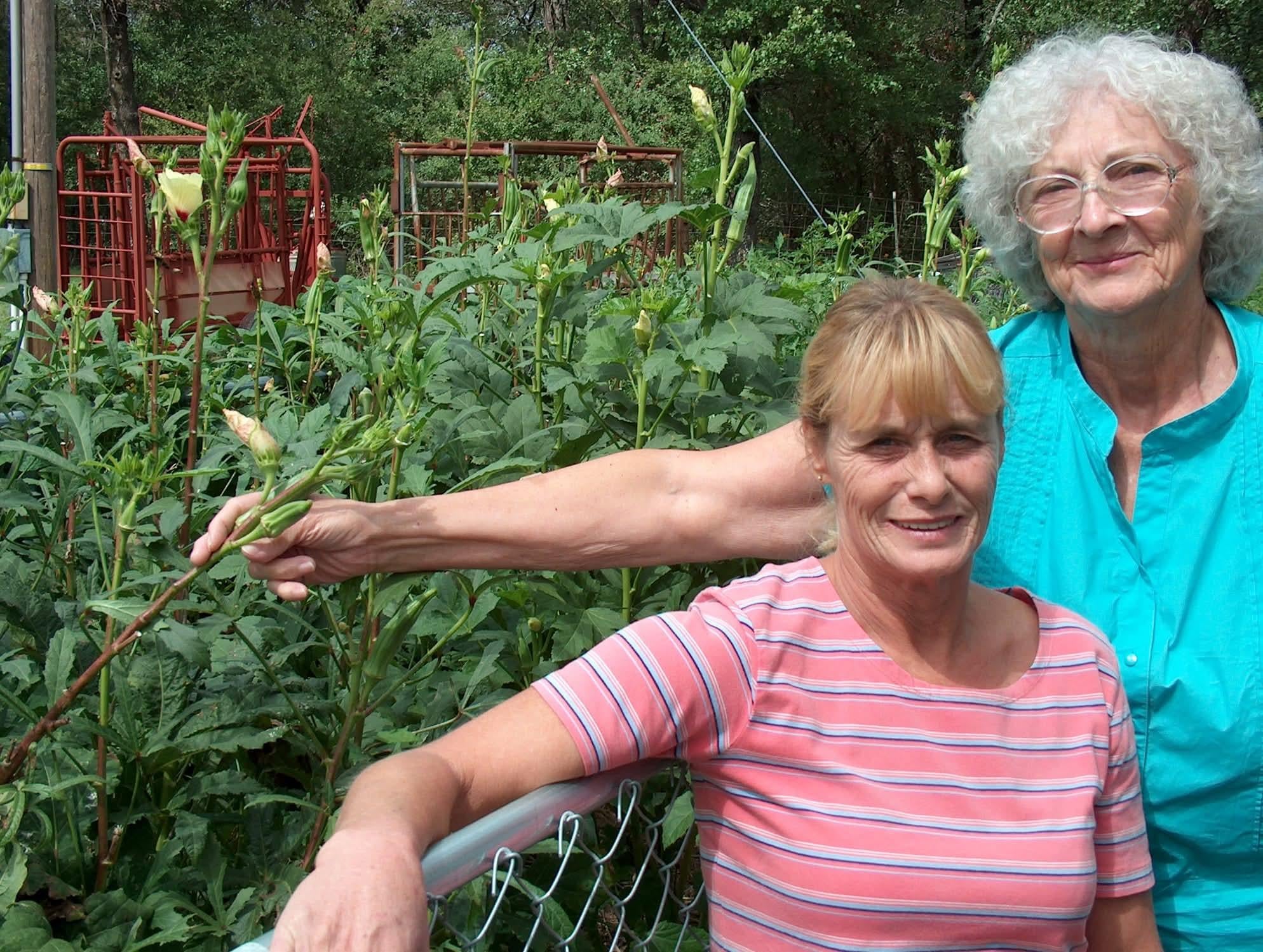 A woman and a woman in a garden