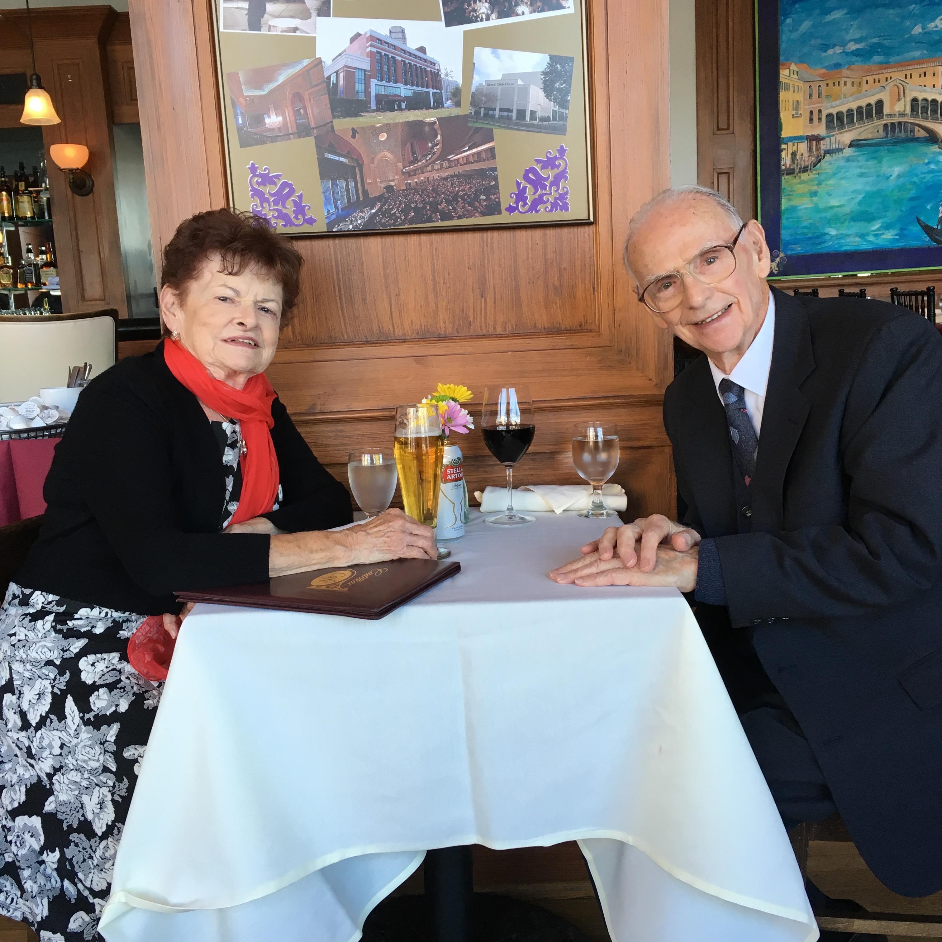 A man and woman sitting at a table